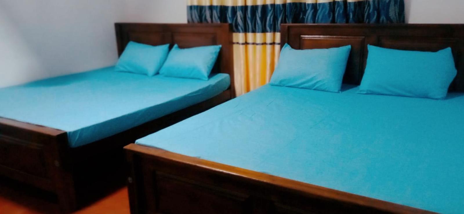Impress Holiday Home Anuradhapura Værelse billede